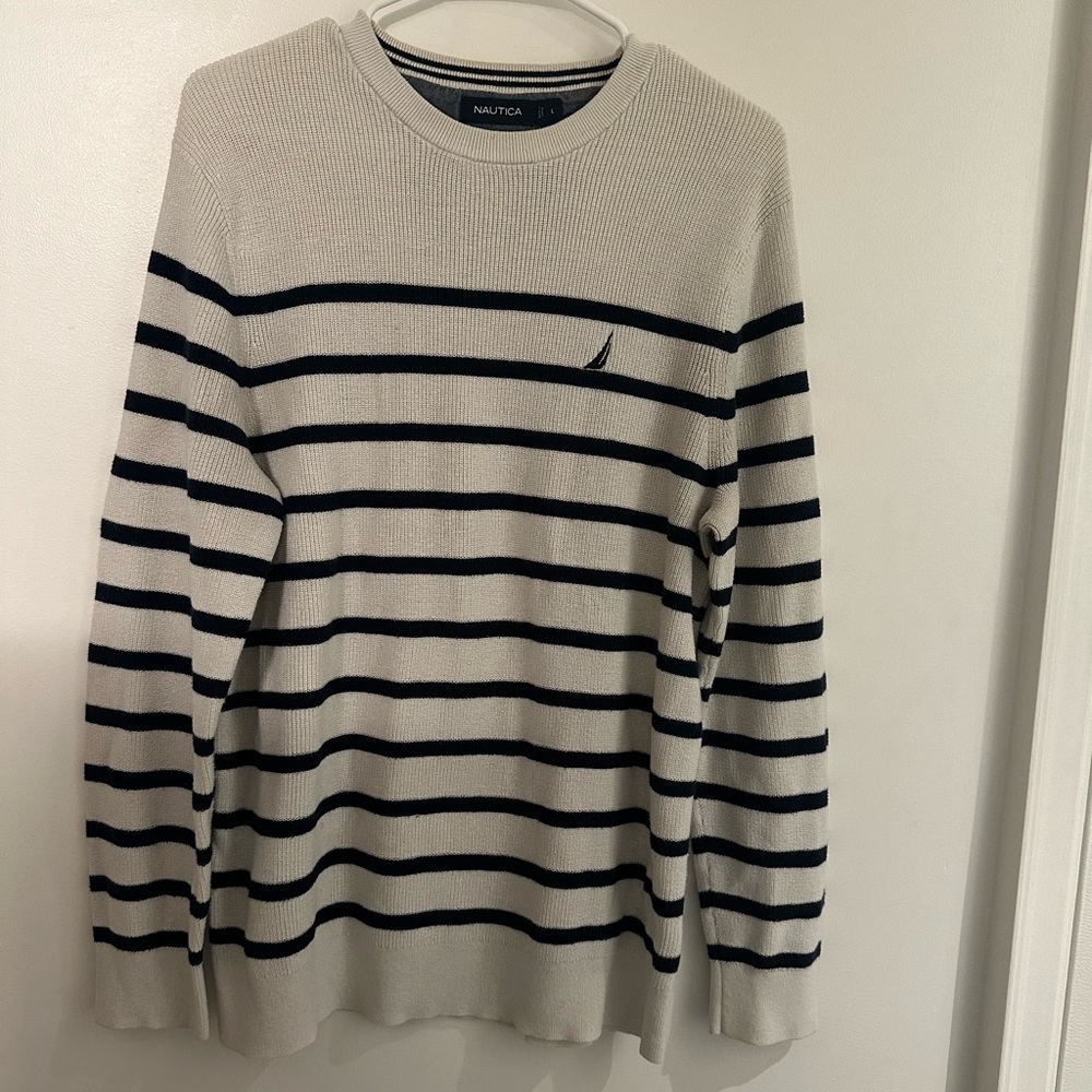 Large navy blue and white striped Nautica crewneck sweater